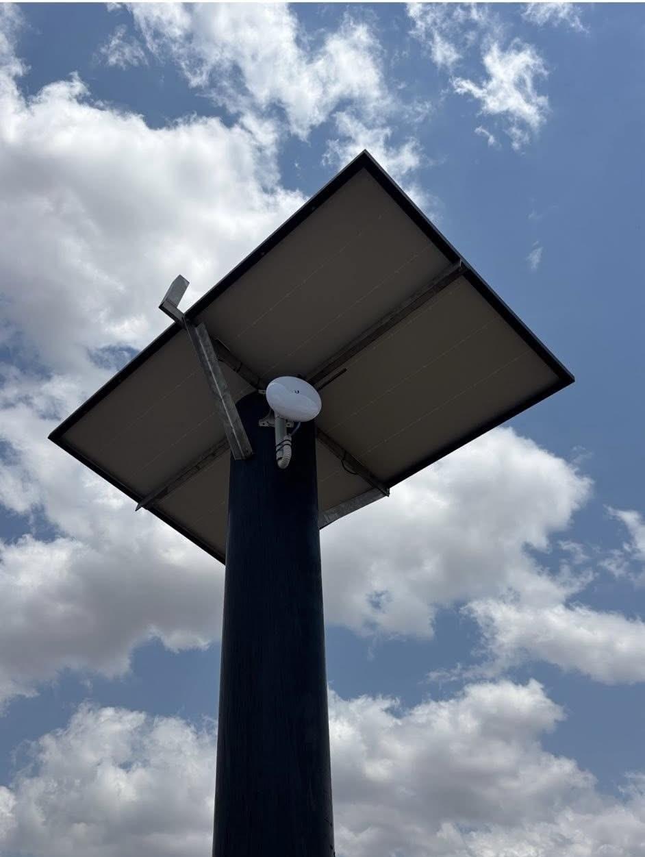 Solar panel with Ubiquiti NanoBeam mounted underneath